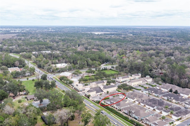 birds eye view of property with a residential view