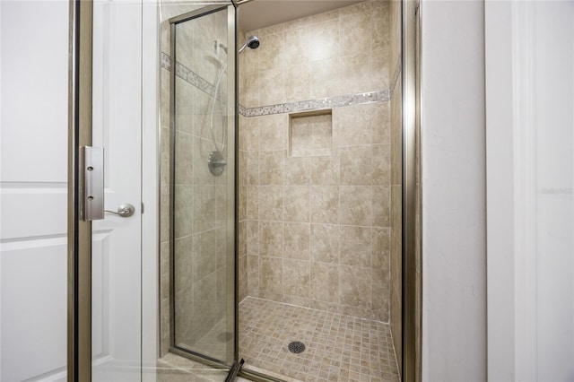 bathroom with a stall shower