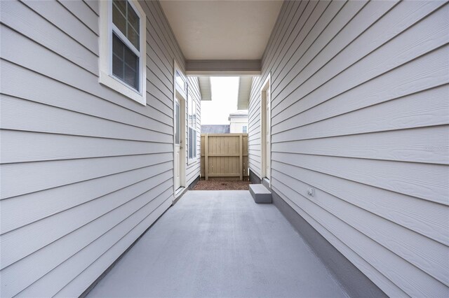 view of side of property featuring a patio area