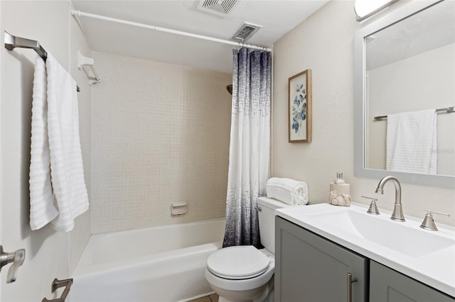 full bath with toilet, vanity, visible vents, and shower / bathtub combination with curtain