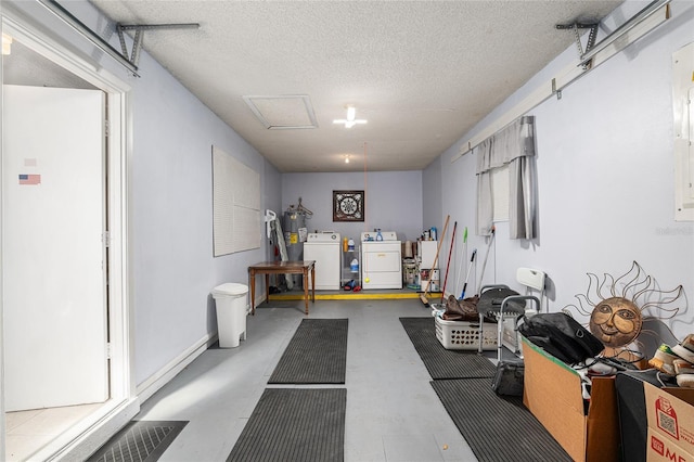 garage featuring washing machine and clothes dryer