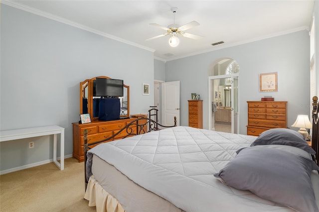 bedroom with baseboards, ornamental molding, visible vents, and light colored carpet