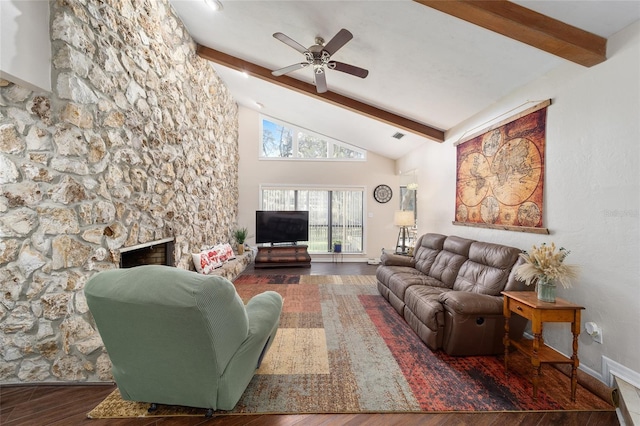 living area with ceiling fan, wood finished floors, a fireplace, high vaulted ceiling, and beam ceiling