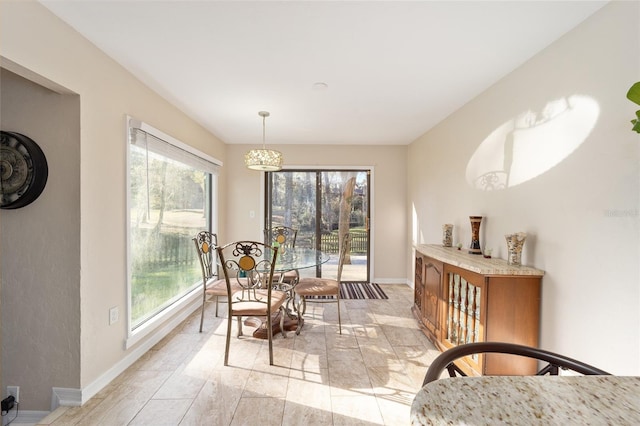 dining space with baseboards