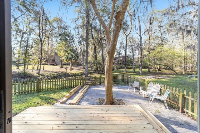 deck with a patio and fence