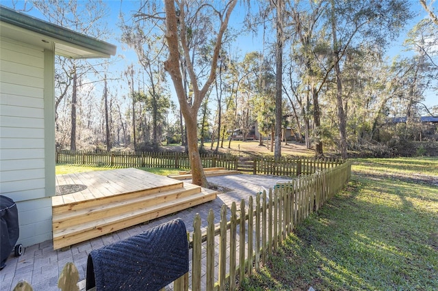 exterior space with a yard and fence