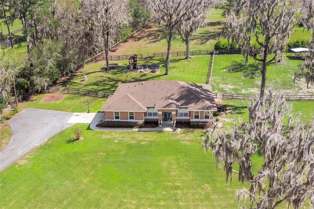 birds eye view of property featuring a rural view