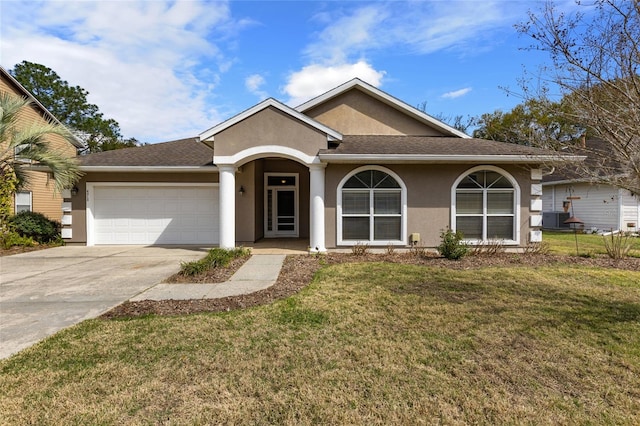 single story home with stucco siding, a front yard, concrete driveway, and an attached garage