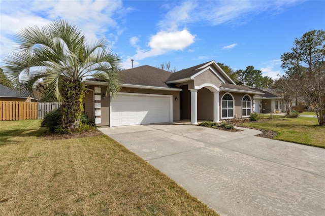 ranch-style home featuring stucco siding, a front lawn, fence, concrete driveway, and an attached garage