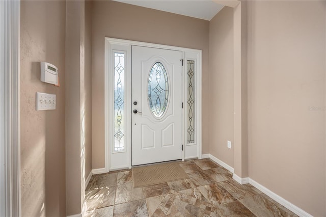 entrance foyer with baseboards