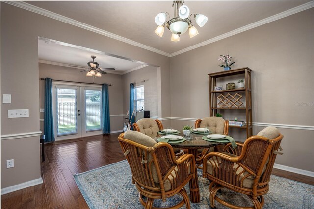 dining room with hardwood / wood-style flooring, french doors, baseboards, and ornamental molding