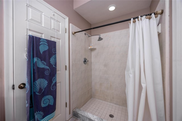 bathroom featuring a shower stall