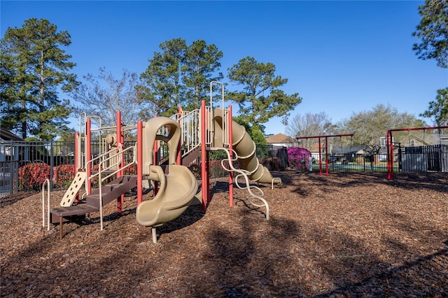 community jungle gym with fence