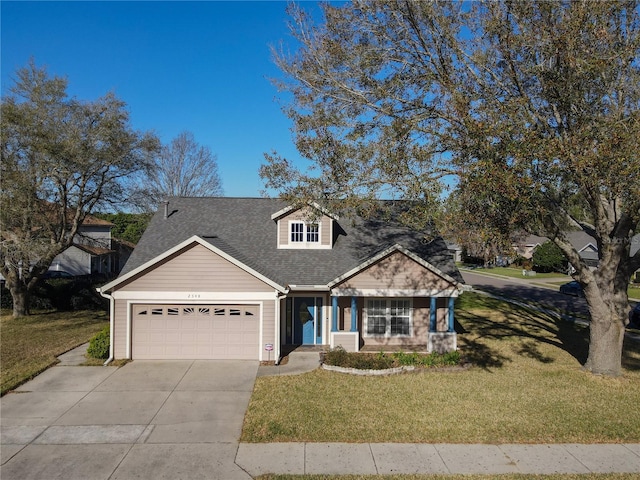 view of front of house featuring a garage, concrete driveway, a front yard, and roof with shingles