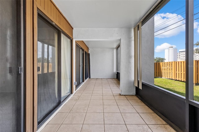 unfurnished sunroom with a view of city