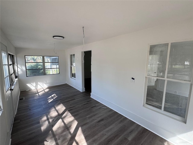 unfurnished sunroom featuring visible vents