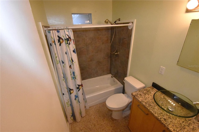 bathroom featuring toilet, shower / bathtub combination with curtain, vanity, and speckled floor