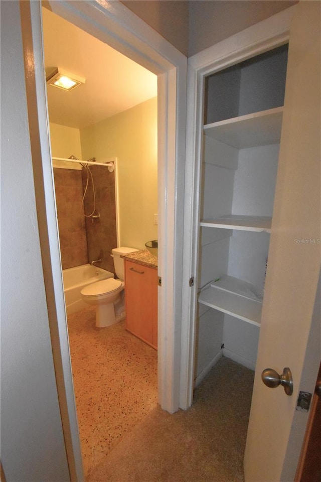 full bath with shower / bathing tub combination, vanity, and toilet