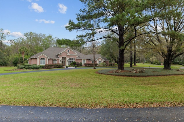 view of front of home with a front lawn