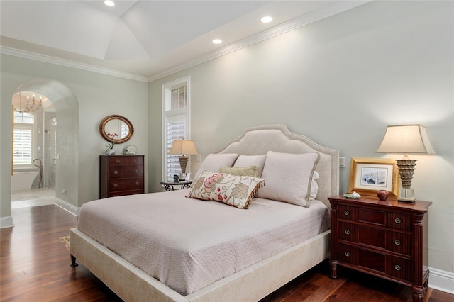 bedroom featuring crown molding, baseboards, dark wood finished floors, recessed lighting, and arched walkways