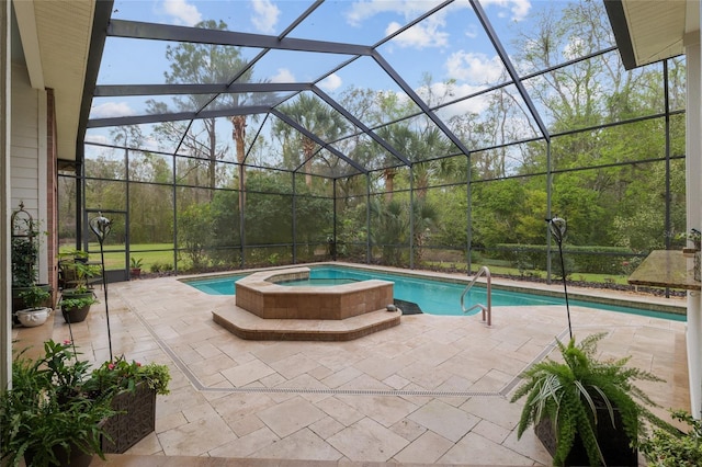 view of swimming pool with a pool with connected hot tub, a lanai, and a patio area