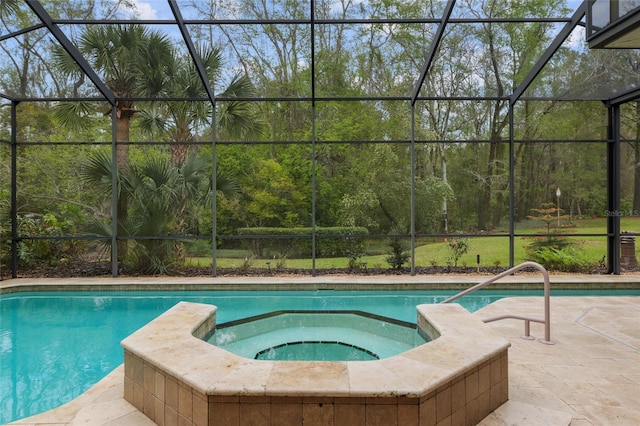 view of pool with a lanai, a pool with connected hot tub, and a patio