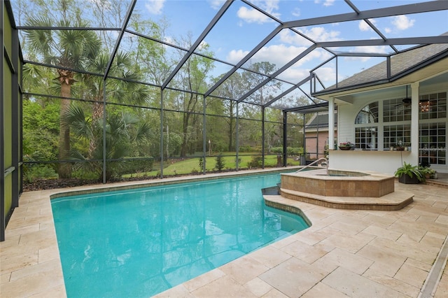 pool with glass enclosure, a patio, and a ceiling fan