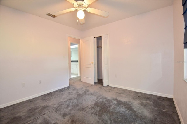 unfurnished bedroom with visible vents, baseboards, ceiling fan, and carpet flooring