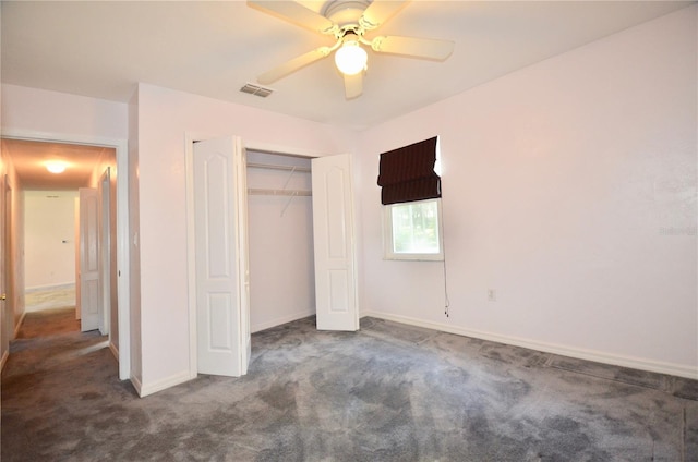 unfurnished bedroom featuring a closet, visible vents, baseboards, and carpet floors