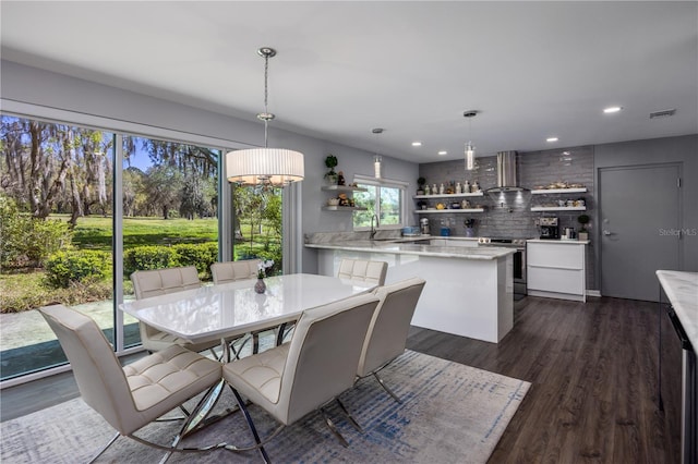 dining area with recessed lighting, visible vents, and dark wood-style flooring