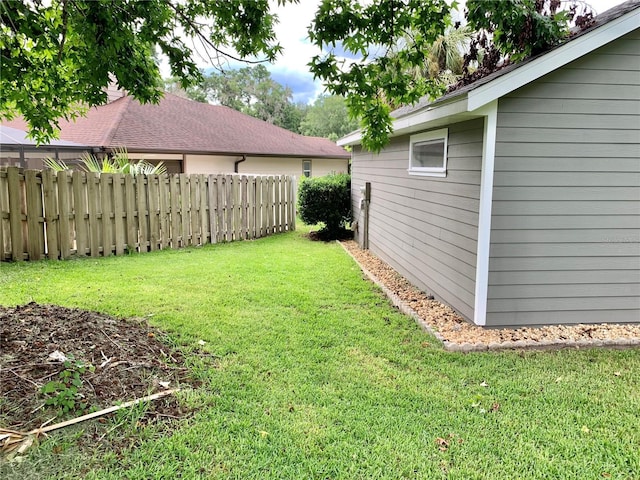 view of yard featuring fence