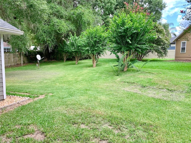 view of yard with fence