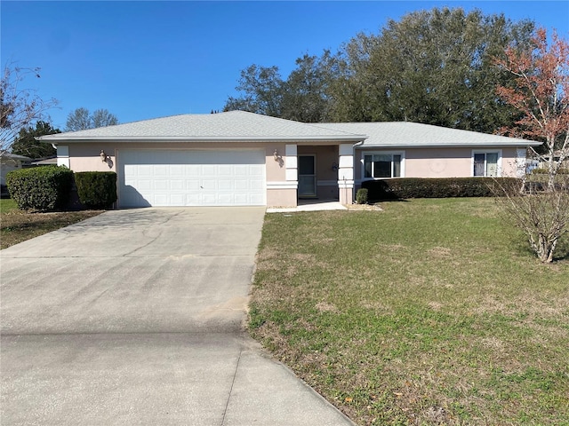 single story home with a front yard, concrete driveway, an attached garage, and stucco siding