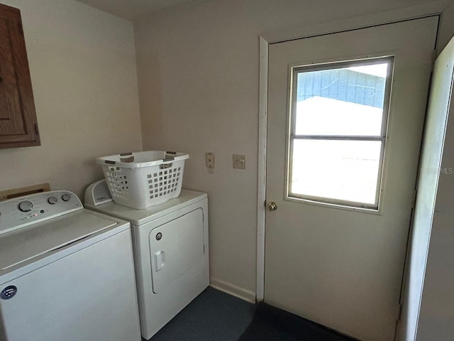 laundry room featuring cabinet space and washing machine and dryer