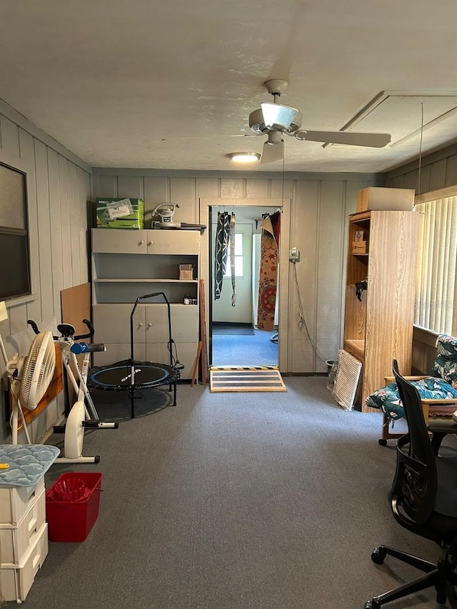interior space featuring a ceiling fan