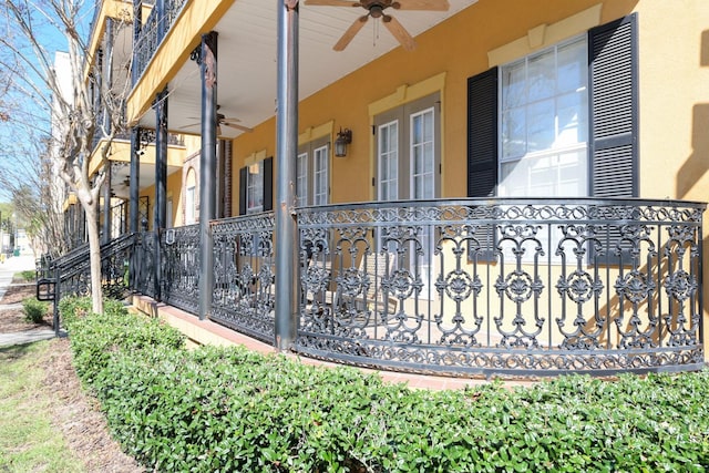 view of home's exterior featuring covered porch and a ceiling fan