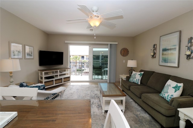 living room with a ceiling fan