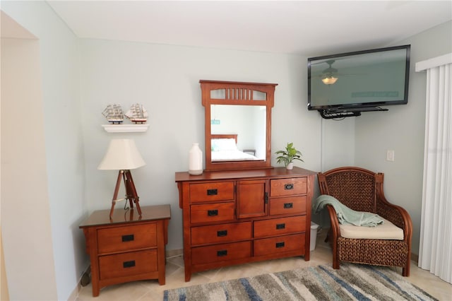 living area featuring light tile patterned floors