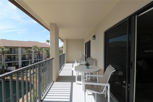 balcony featuring a sunroom