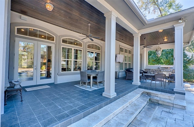 view of patio / terrace with french doors and ceiling fan