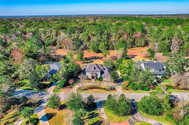 bird's eye view featuring a view of trees