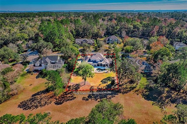 bird's eye view with a view of trees