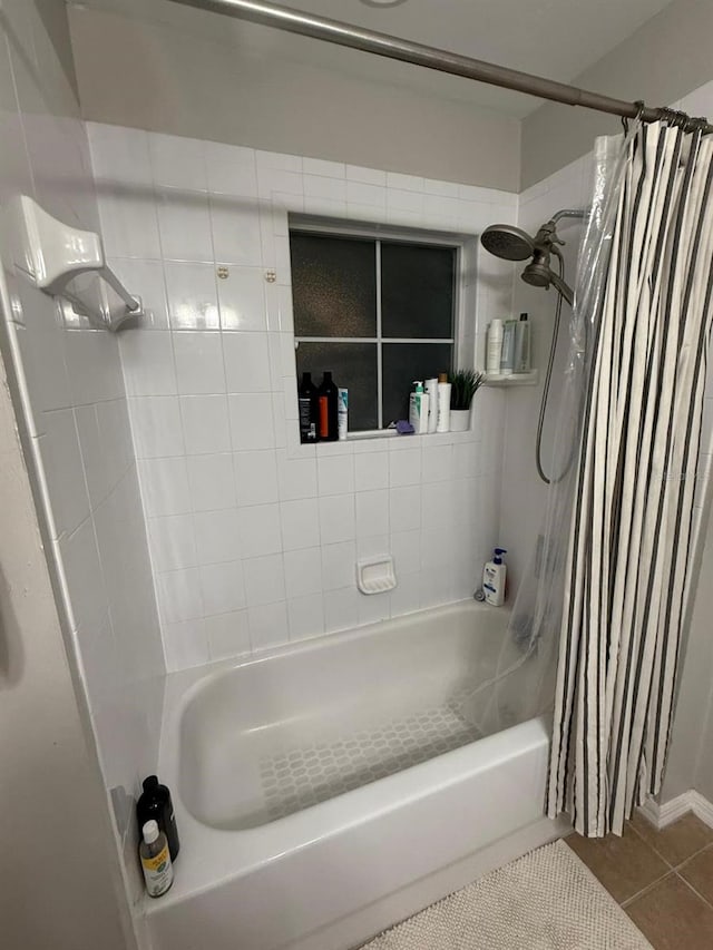 bathroom featuring tile patterned floors and shower / bath combo