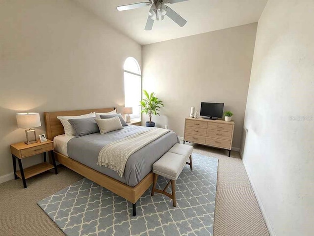 bedroom featuring ceiling fan, carpet flooring, and baseboards