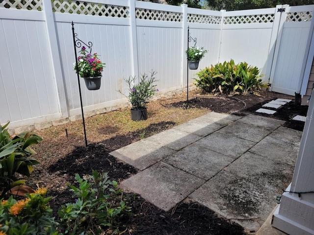 view of patio with a fenced backyard