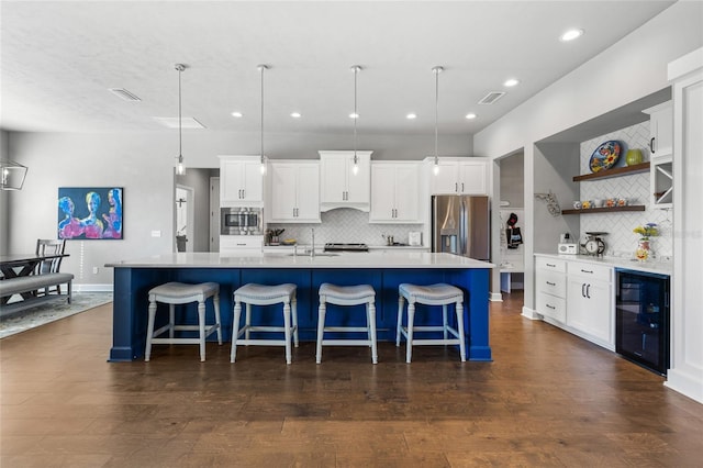 kitchen with visible vents, beverage cooler, open shelves, white cabinetry, and appliances with stainless steel finishes