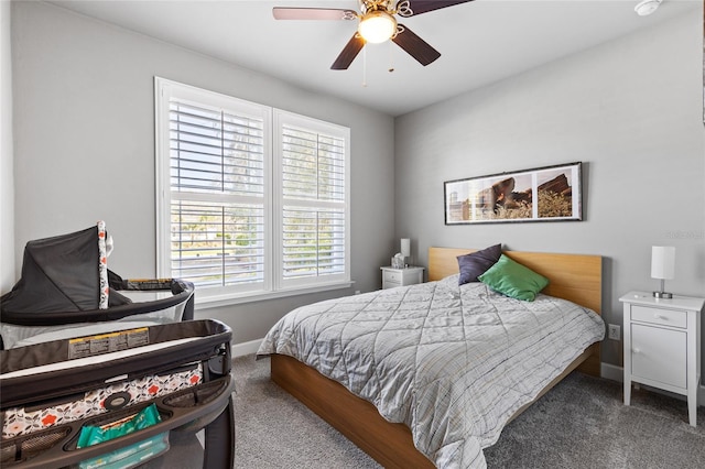 bedroom with carpet flooring, a ceiling fan, and baseboards