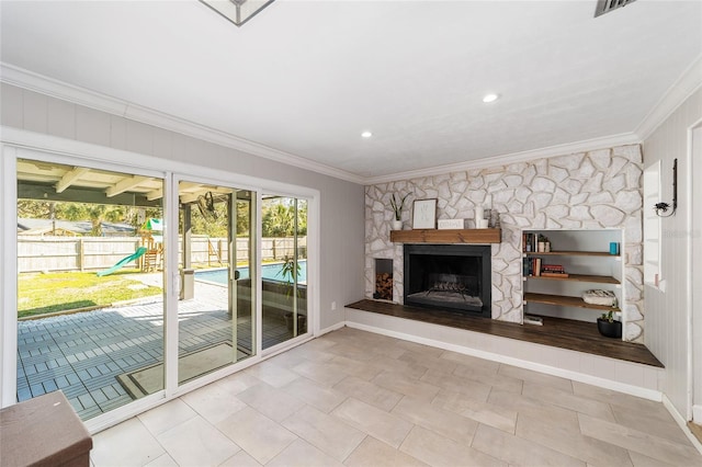 unfurnished living room with a stone fireplace and crown molding