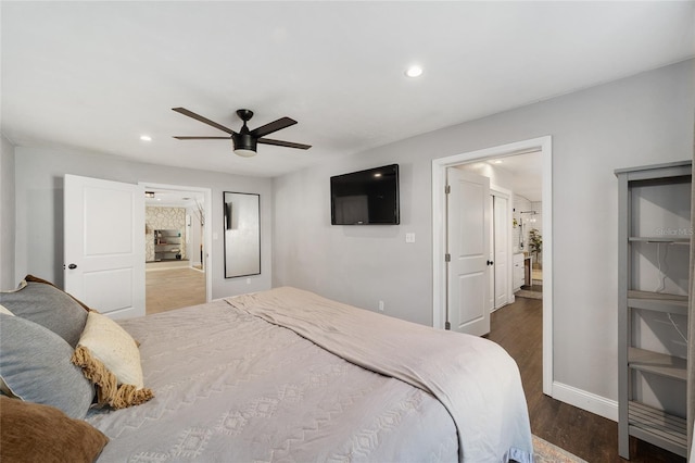 bedroom featuring baseboards, wood finished floors, a ceiling fan, and recessed lighting