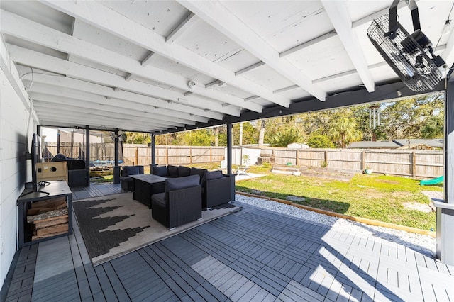 wooden deck with a fenced backyard, a yard, outdoor lounge area, and a patio